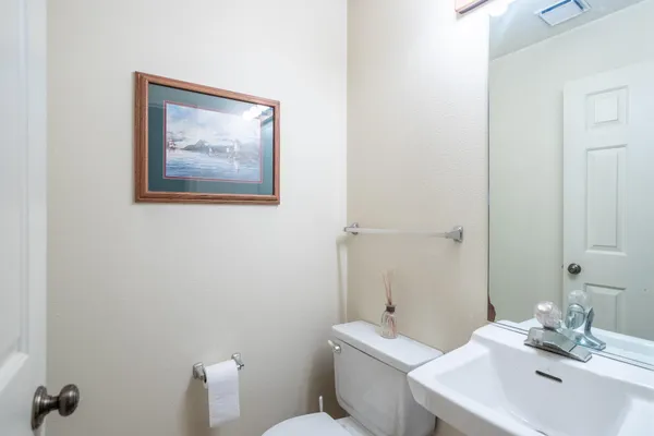 a view of balcony with wooden floor and fence