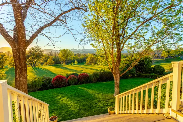 a view of a lake from a balcony