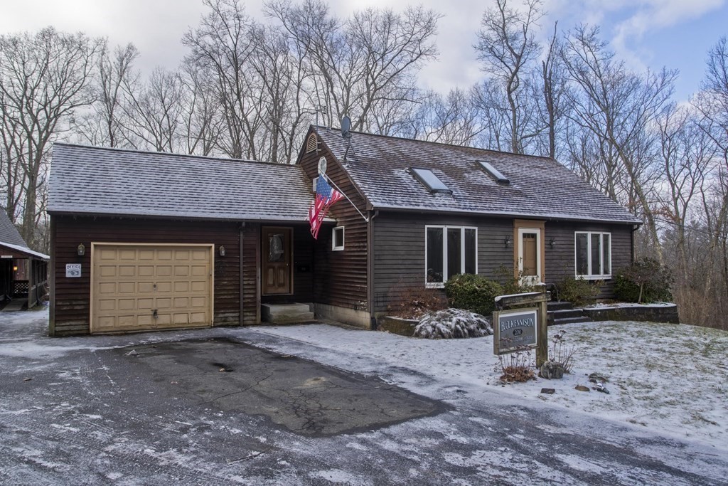 200 Town Farm Road Monson, MA 01057 - Photo 1 of 42 a front view of a house with garden