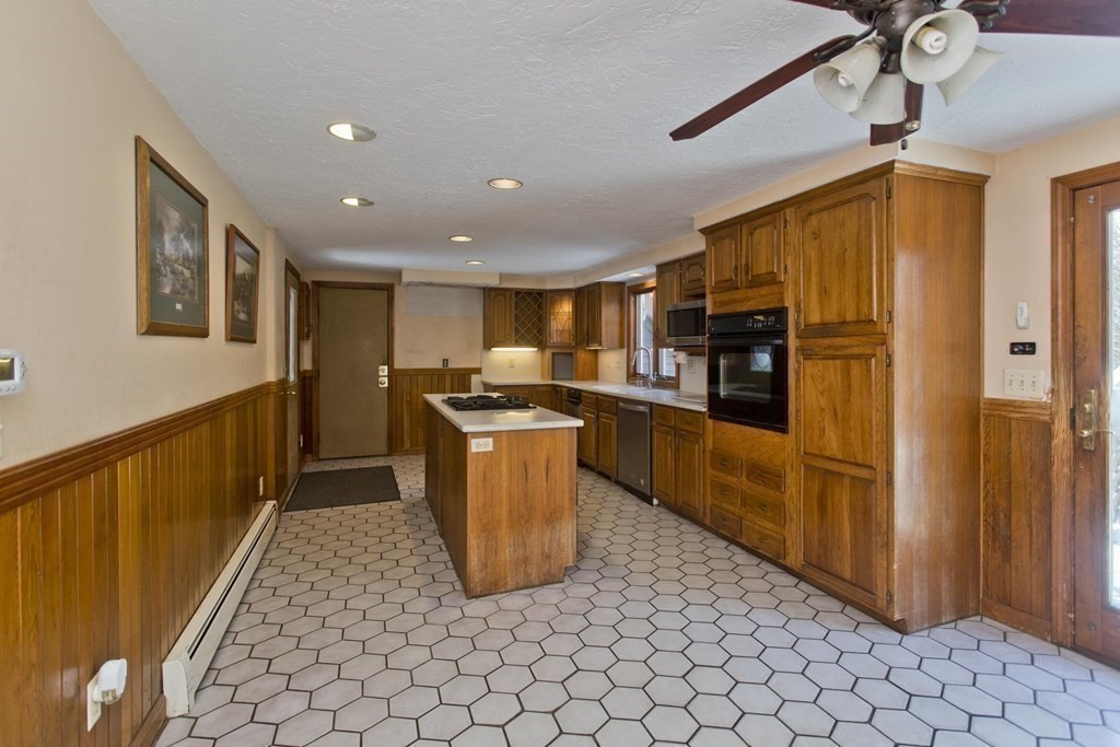 200 Town Farm Road Monson, MA 01057 - Photo 16 of 42 a kitchen with sink refrigerator and cabinets