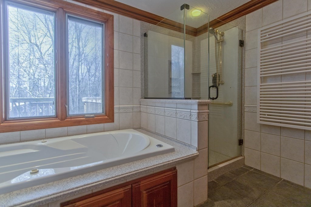 200 Town Farm Road Monson, MA 01057 - Photo 23 of 42 a bathroom with a shower and a bathtub