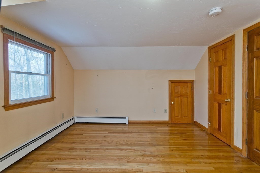 200 Town Farm Road Monson, MA 01057 - Photo 26 of 42 a view of an empty room with wooden floor and a window