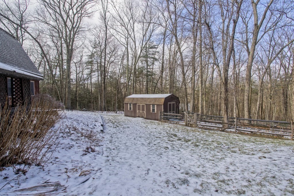 200 Town Farm Road Monson, MA 01057 - Photo 3 of 42 a house with trees in front of it