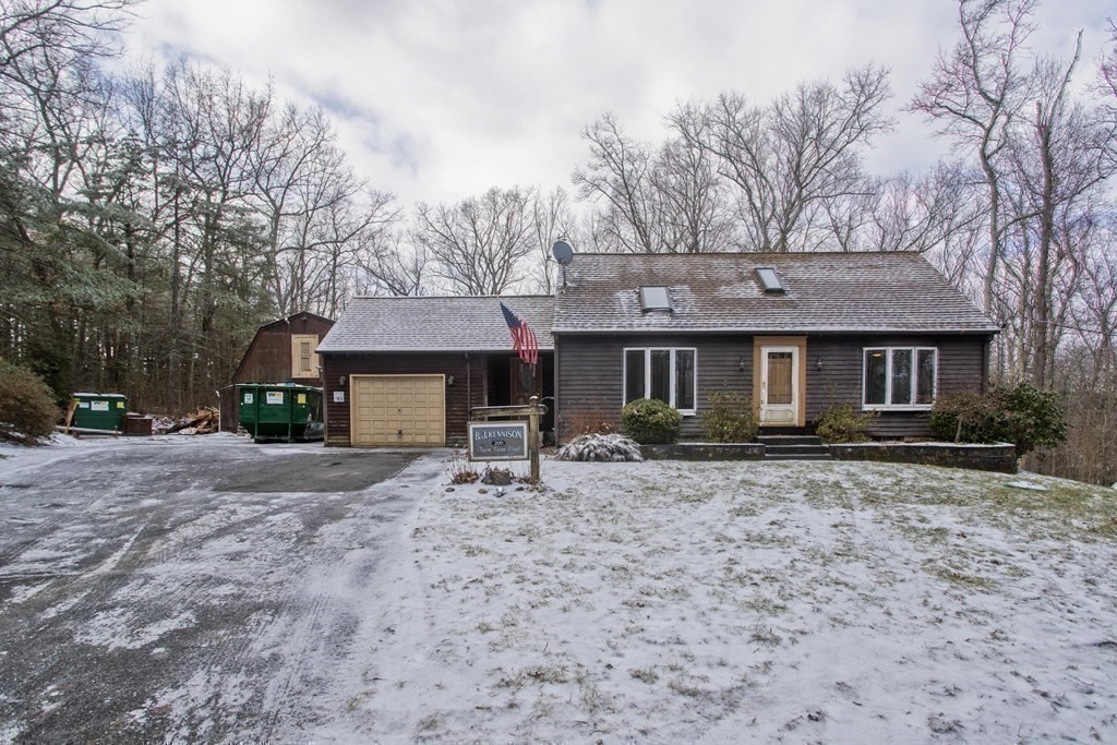 200 Town Farm Road Monson, MA 01057 - Photo 42 of 42 a front view of a house with yard tree and wooden fence