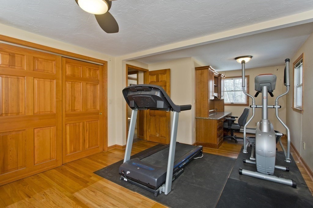 200 Town Farm Road Monson, MA 01057 - Photo 8 of 42 a room with gym equipment and large window