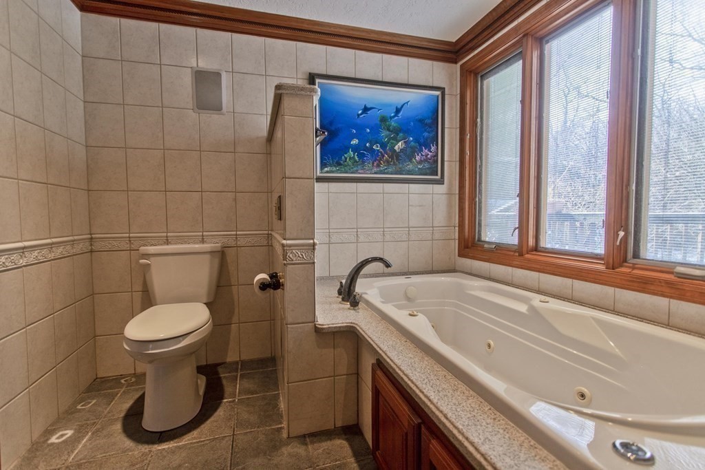 200 Town Farm Road Monson, MA 01057 - Photo 9 of 42 a bathroom with a toilet a sink and a shower