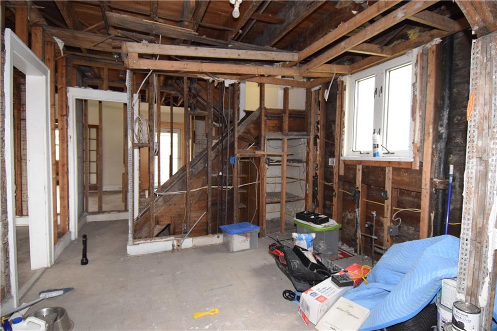 621 Watson Street Coraopolis, PA 15108 - Photo 15 of 32 a room with furniture and a chandelier