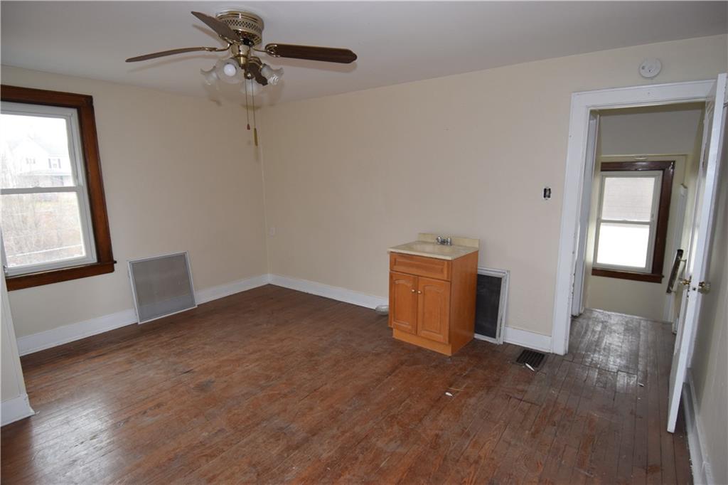 621 Watson Street Coraopolis, PA 15108 - Photo 18 of 32 a view of empty room with ceiling fan