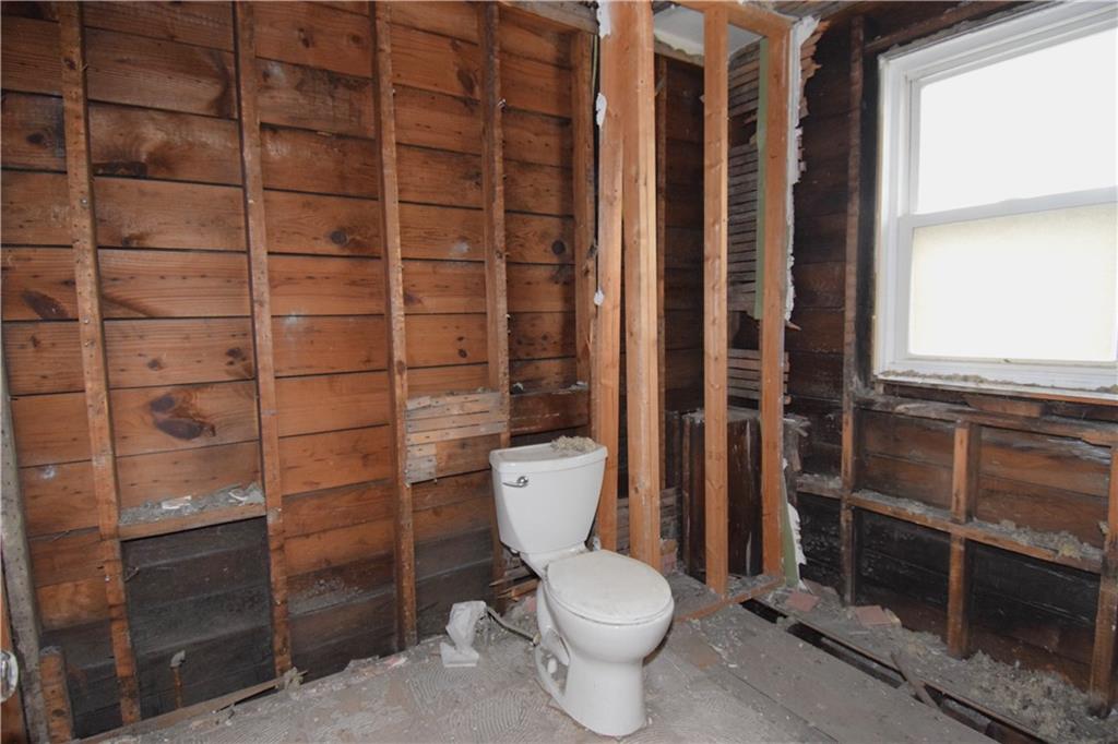 621 Watson Street Coraopolis, PA 15108 - Photo 22 of 32 a white toilet sitting next to a bathroom sink
