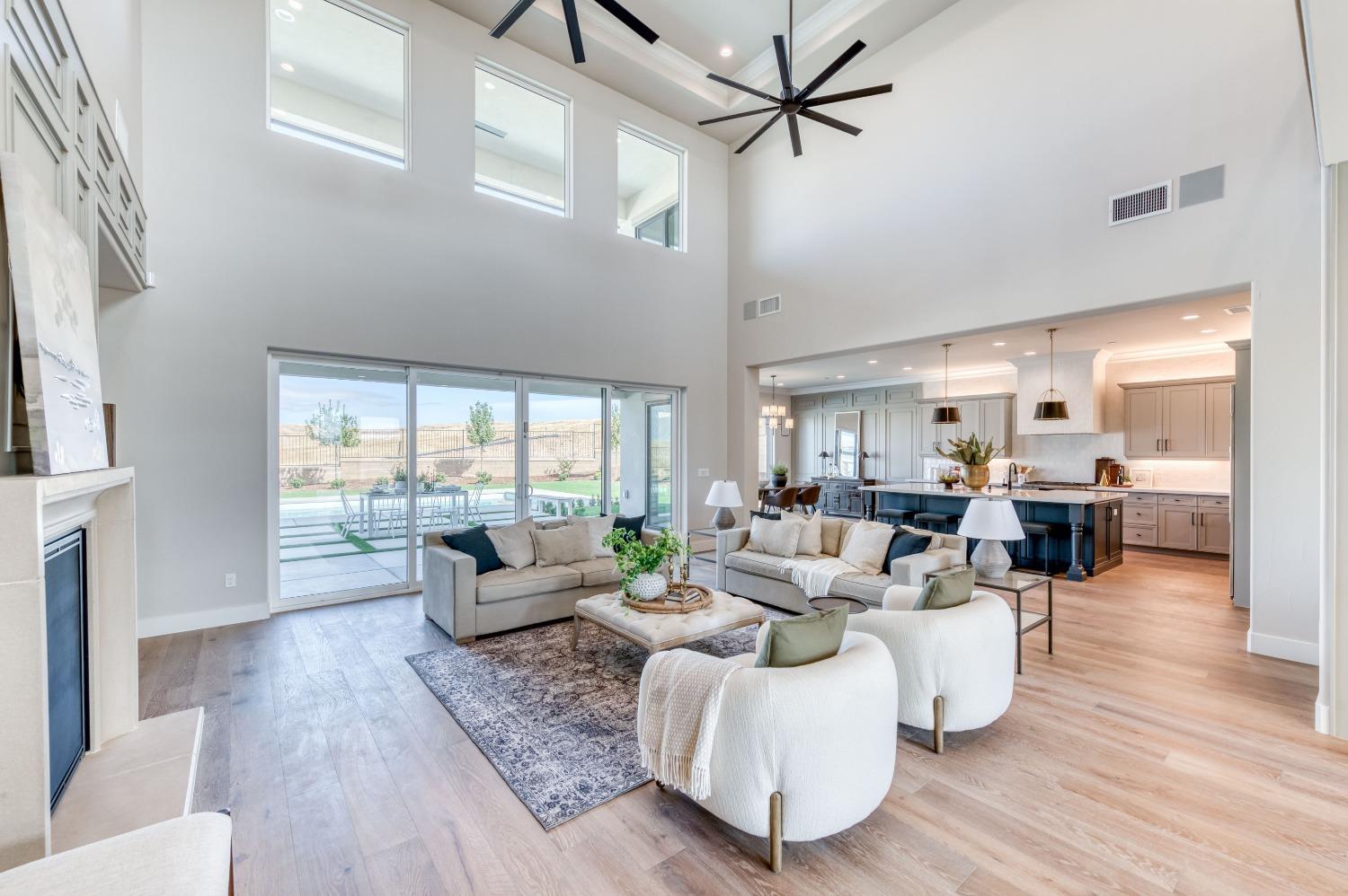 881 Terrace Place Madera, CA 93636 - Photo 13 of 85 a living room with furniture and a large window