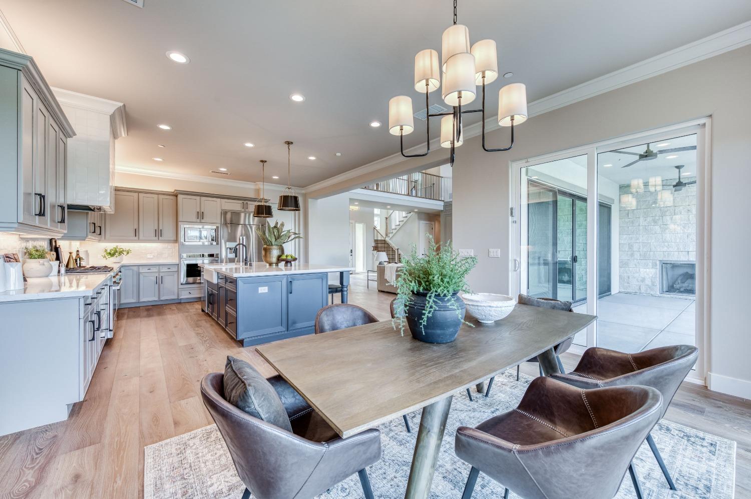 881 Terrace Place Madera, CA 93636 - Photo 24 of 85 a view of kitchen and dining area with furniture