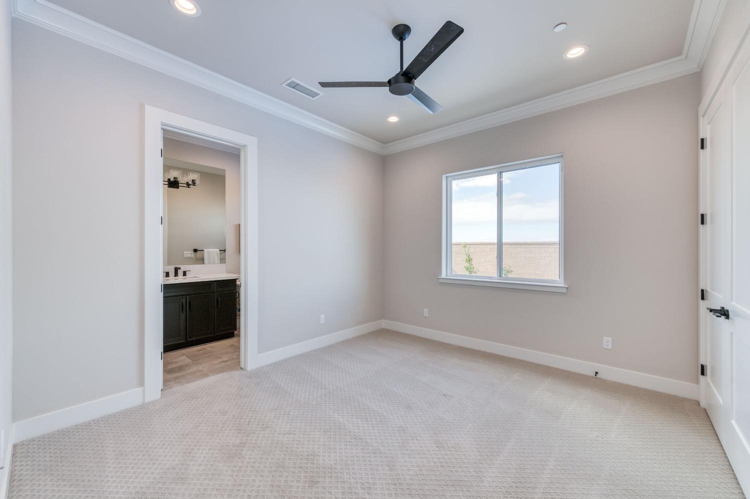 881 Terrace Place Madera, CA 93636 - Photo 27 of 85 a view of an empty room with a window
