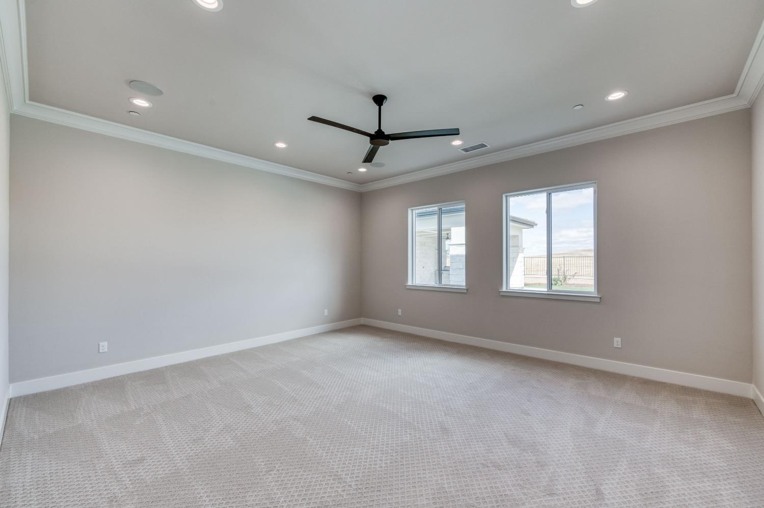 881 Terrace Place Madera, CA 93636 - Photo 32 of 85 wooden floor in an empty room with a window