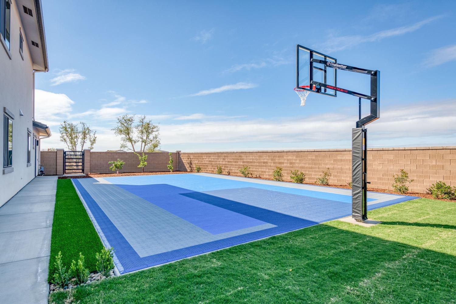 881 Terrace Place Madera, CA 93636 - Photo 45 of 85 a view of a backyard with lawn chairs floor to ceiling window and lake view