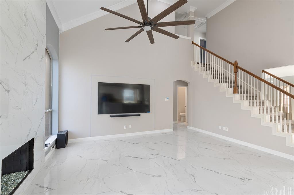 225 Freedom Court Rockwall, TX 75032 - Photo 8 of 28 a view of livingroom with furniture and flat screen tv