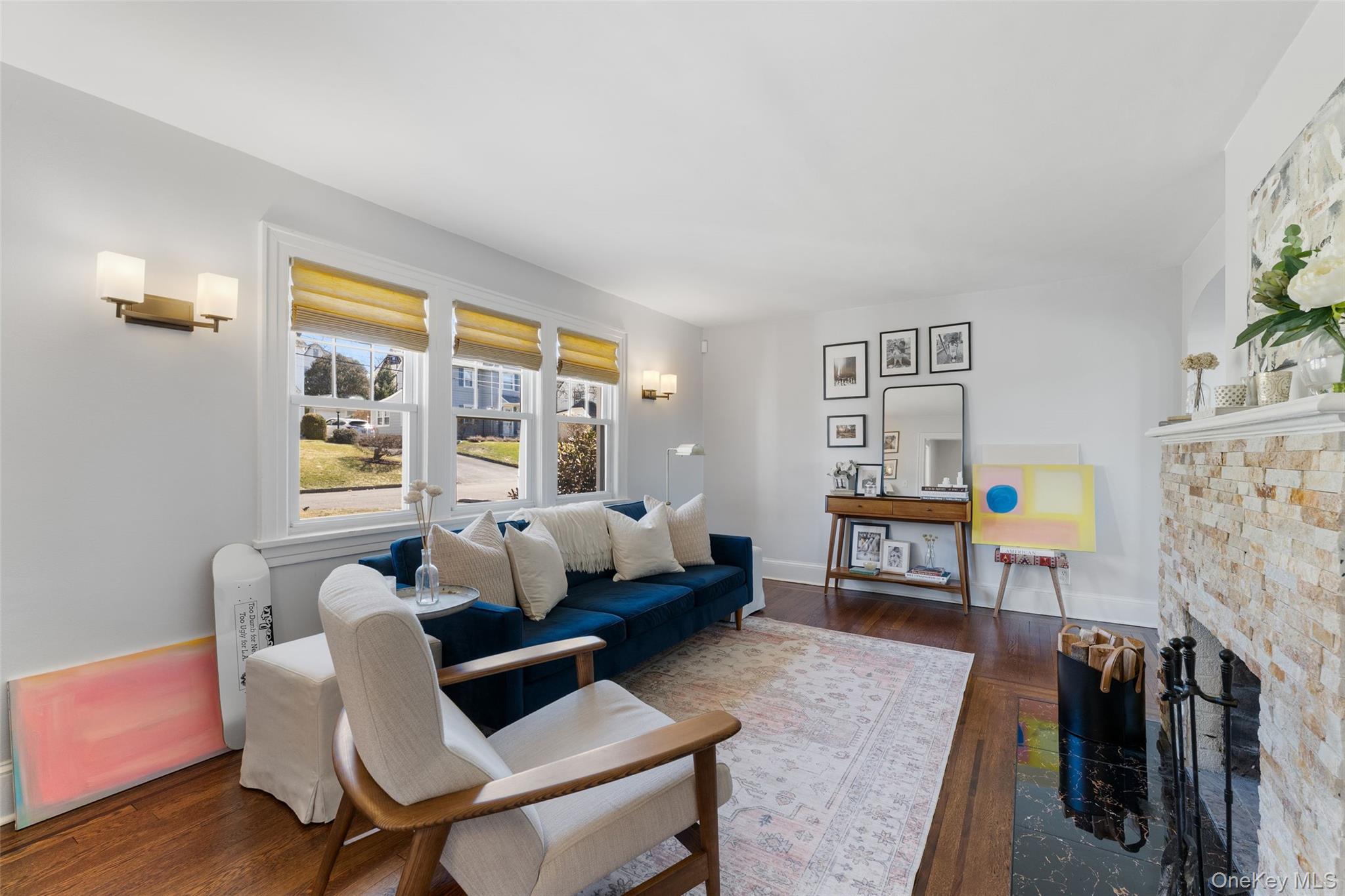 9 Rutgers Place Scarsdale, NY 10583 - Photo 3 of 36 Living room with wood burning fireplace