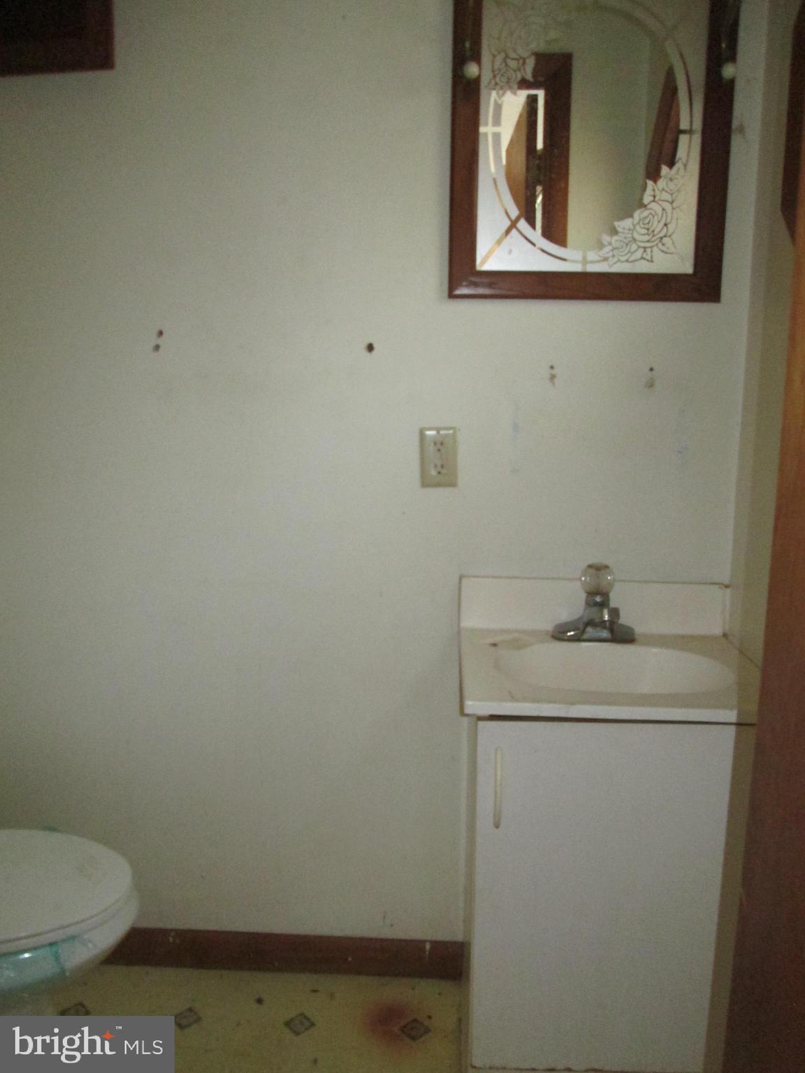 1600 Philadelphia Road Joppa, MD 21085 - Photo 15 of 20 a bathroom with a toilet and a sink