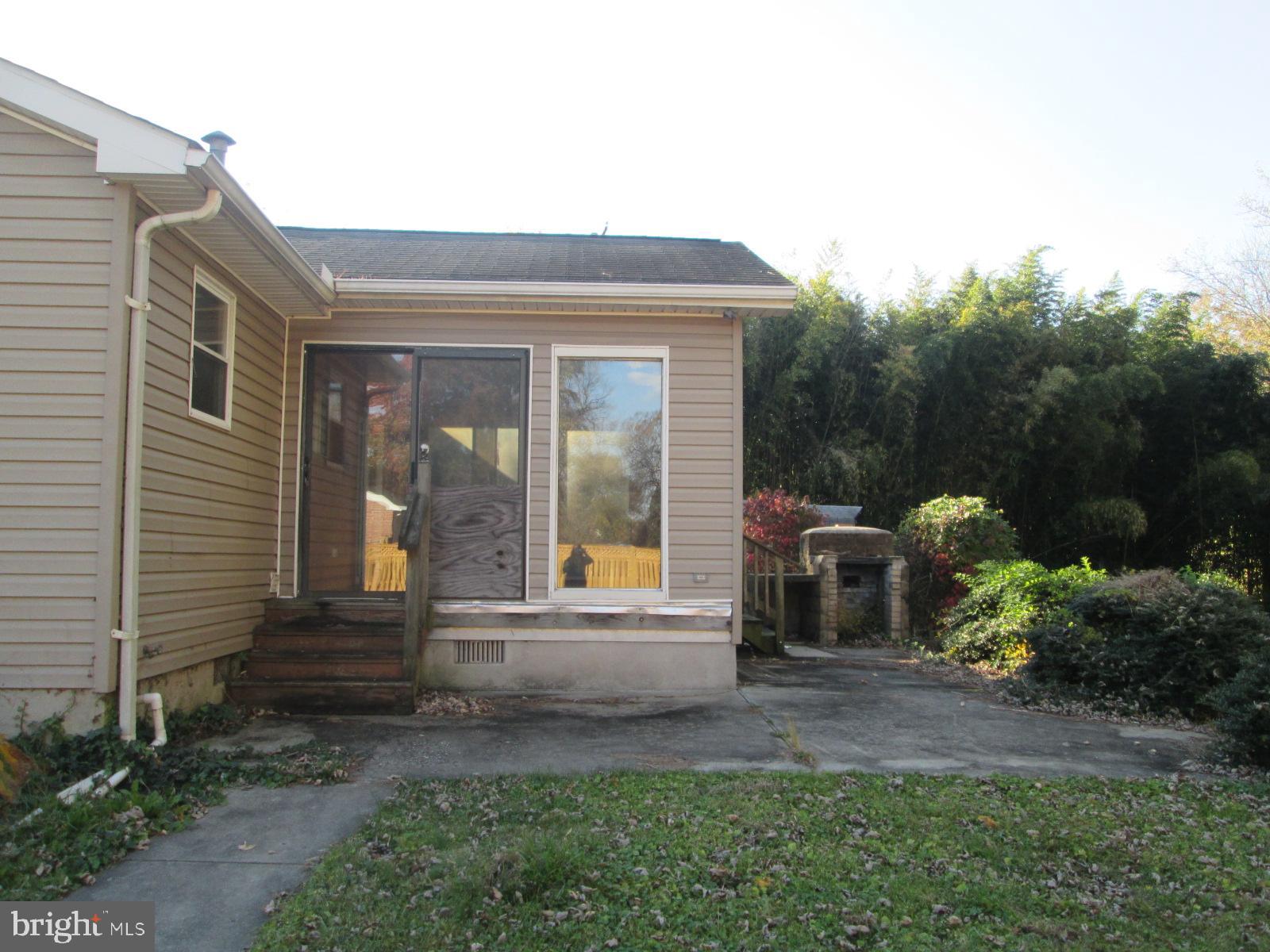 1600 Philadelphia Road Joppa, MD 21085 - Photo 7 of 20 a front view of a house with garden