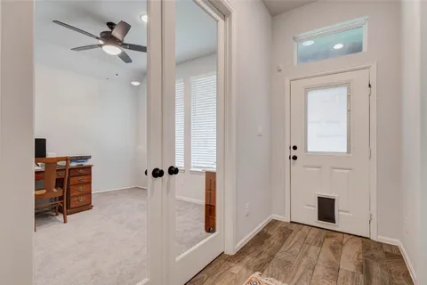 wooden floor in an empty room with a closet