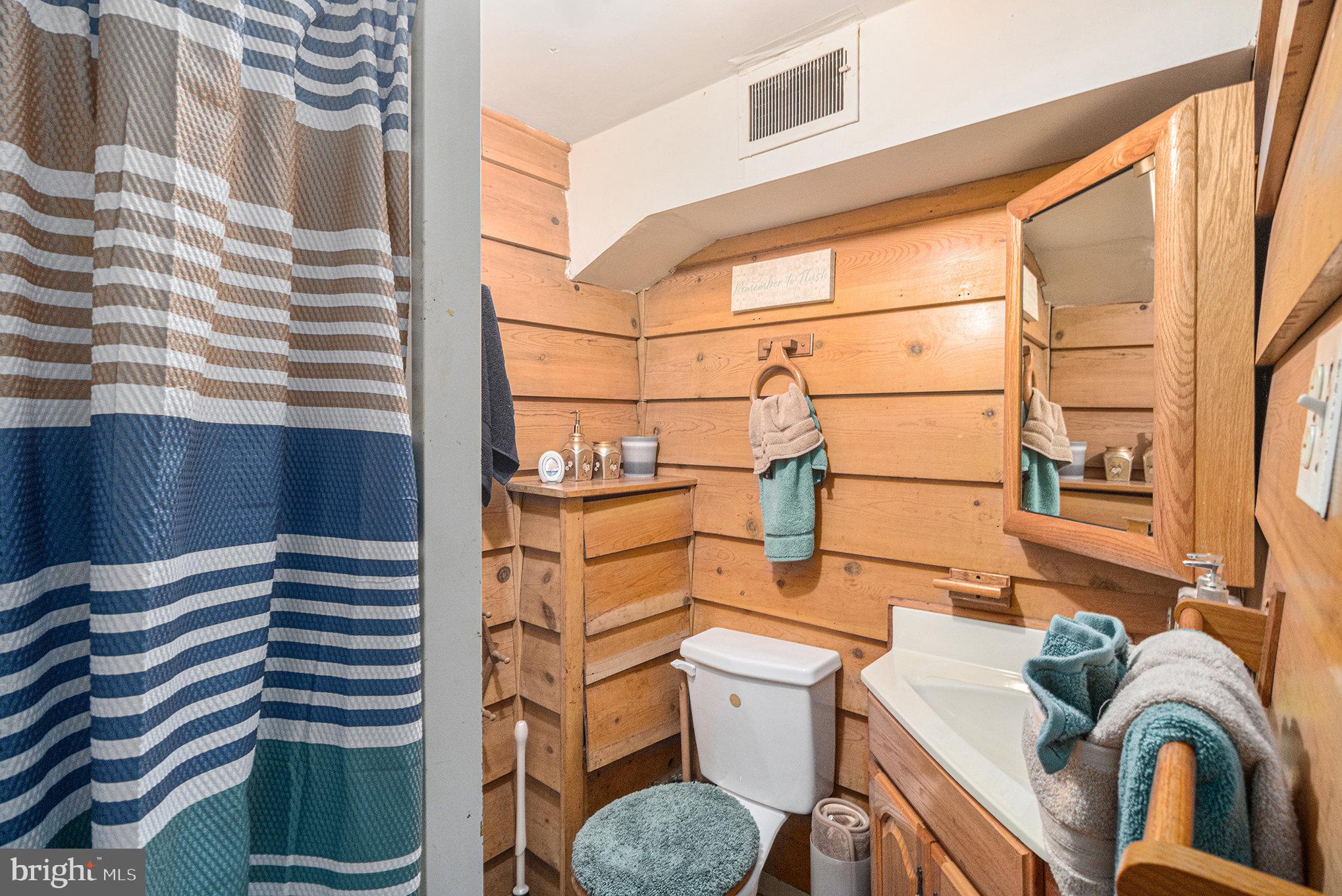 407 Rices Mill Road Wyncote, PA 19095 - Photo 22 of 29 a bathroom with a sink toilet and shower