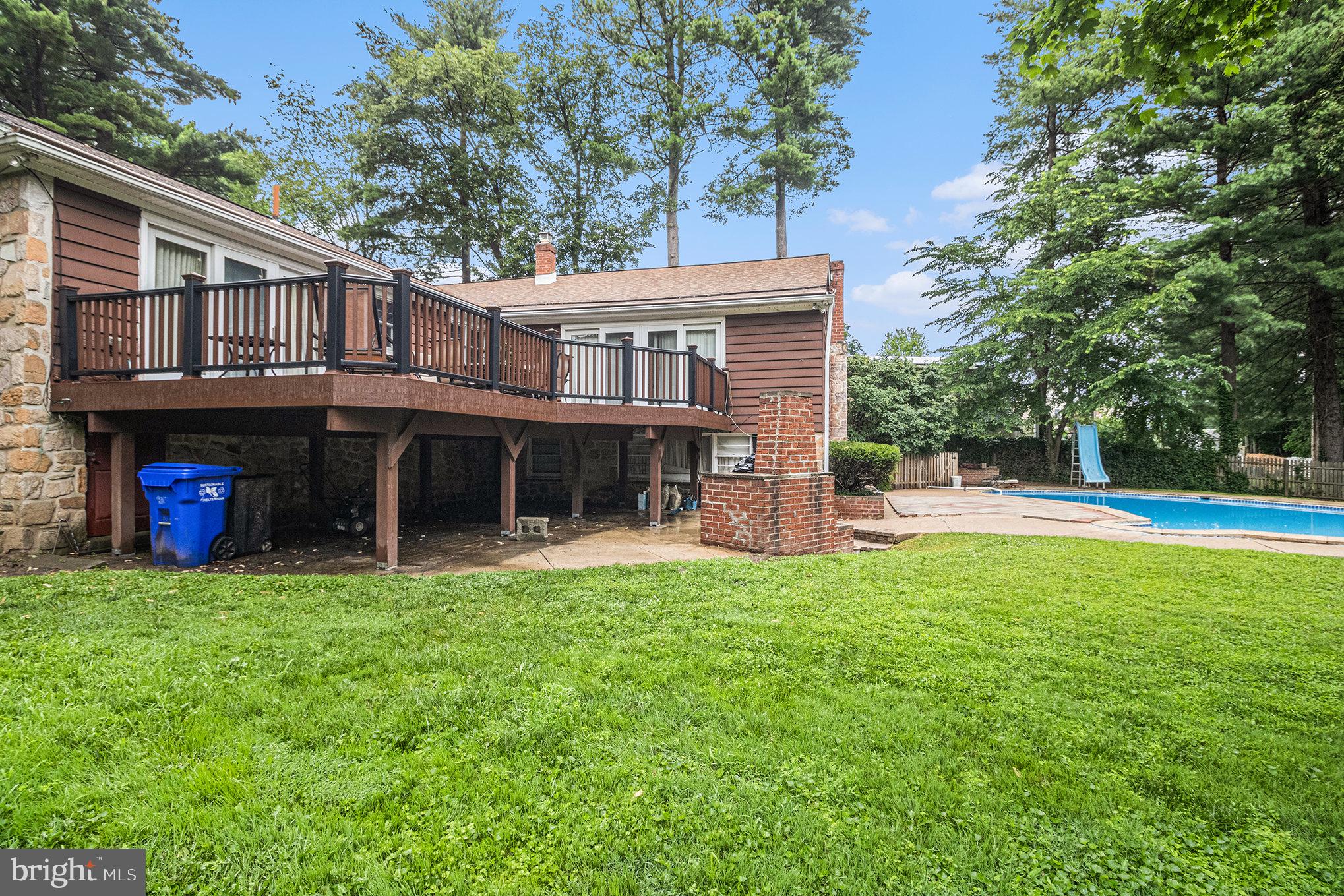 407 Rices Mill Road Wyncote, PA 19095 - Photo 25 of 29 a view of a house with a yard and a large tree