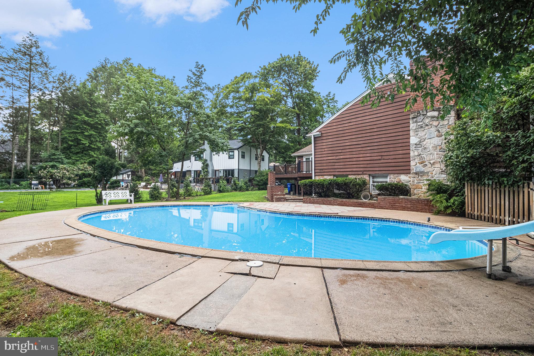407 Rices Mill Road Wyncote, PA 19095 - Photo 27 of 29 a view of outdoor space and swimming pool