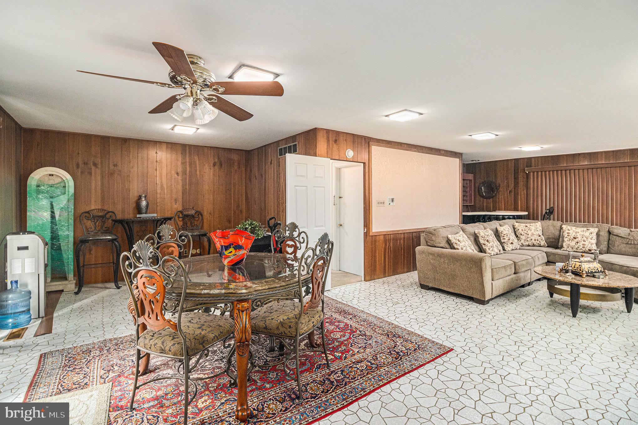 407 Rices Mill Road Wyncote, PA 19095 - Photo 10 of 29 a living room with furniture and kitchen view