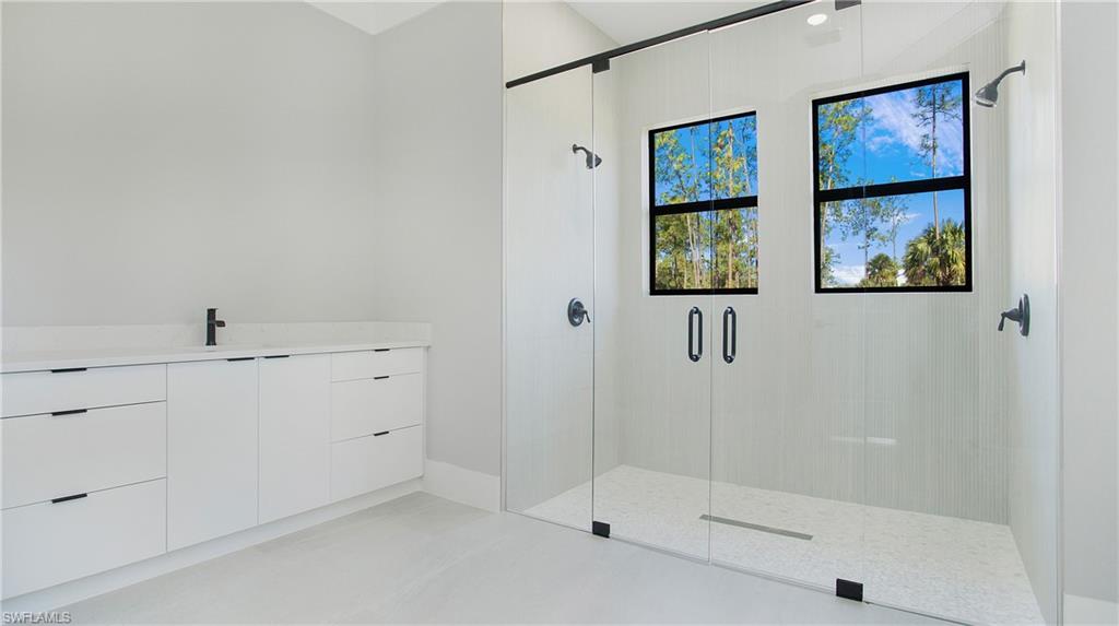 3518 2nd Avenue Southeast Naples, FL 34117 - Photo 27 of 41 a bathroom with a shower