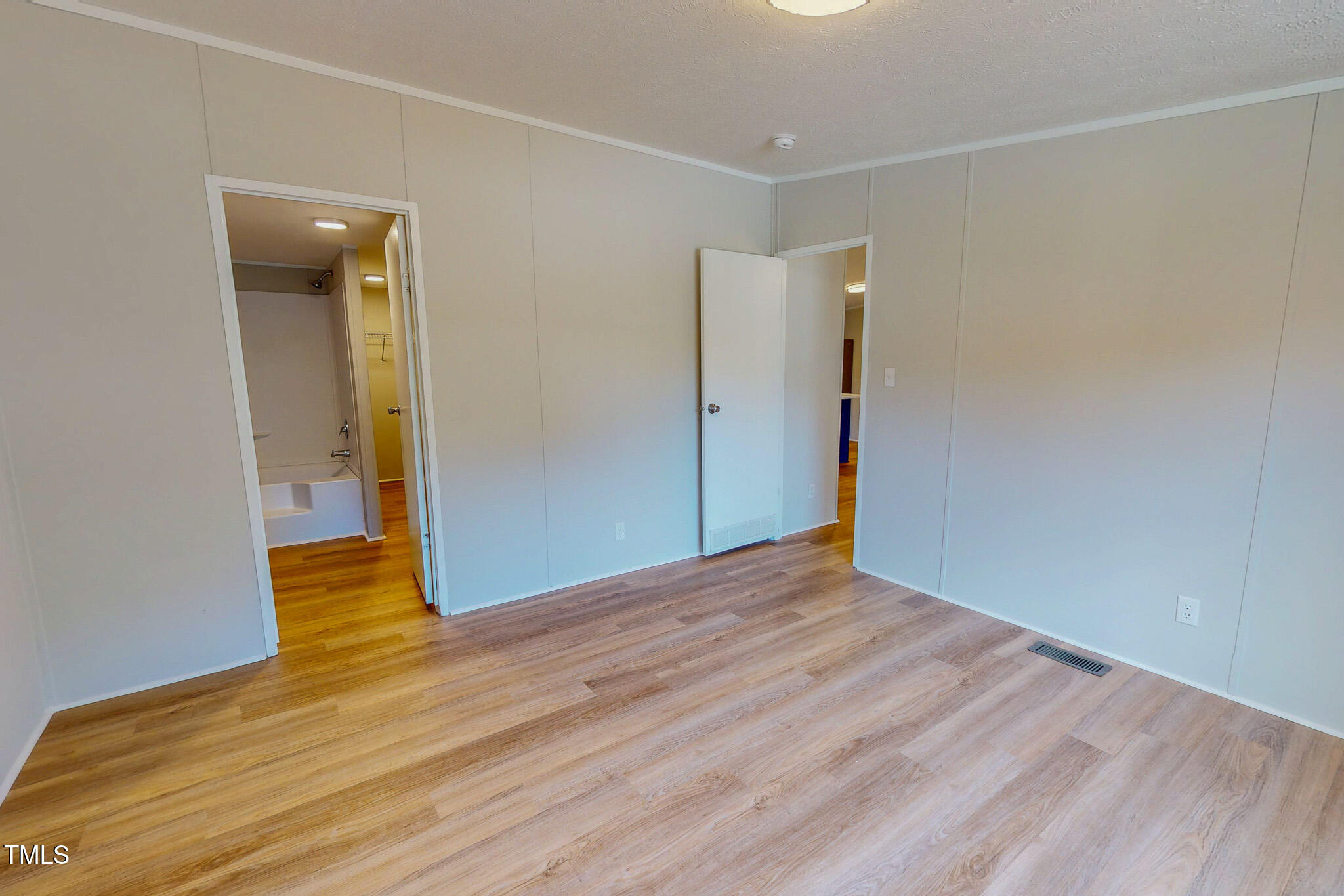 72 Red Field Lane Timberlake, NC 27583 - Photo 13 of 36 a view of empty room with wooden floor