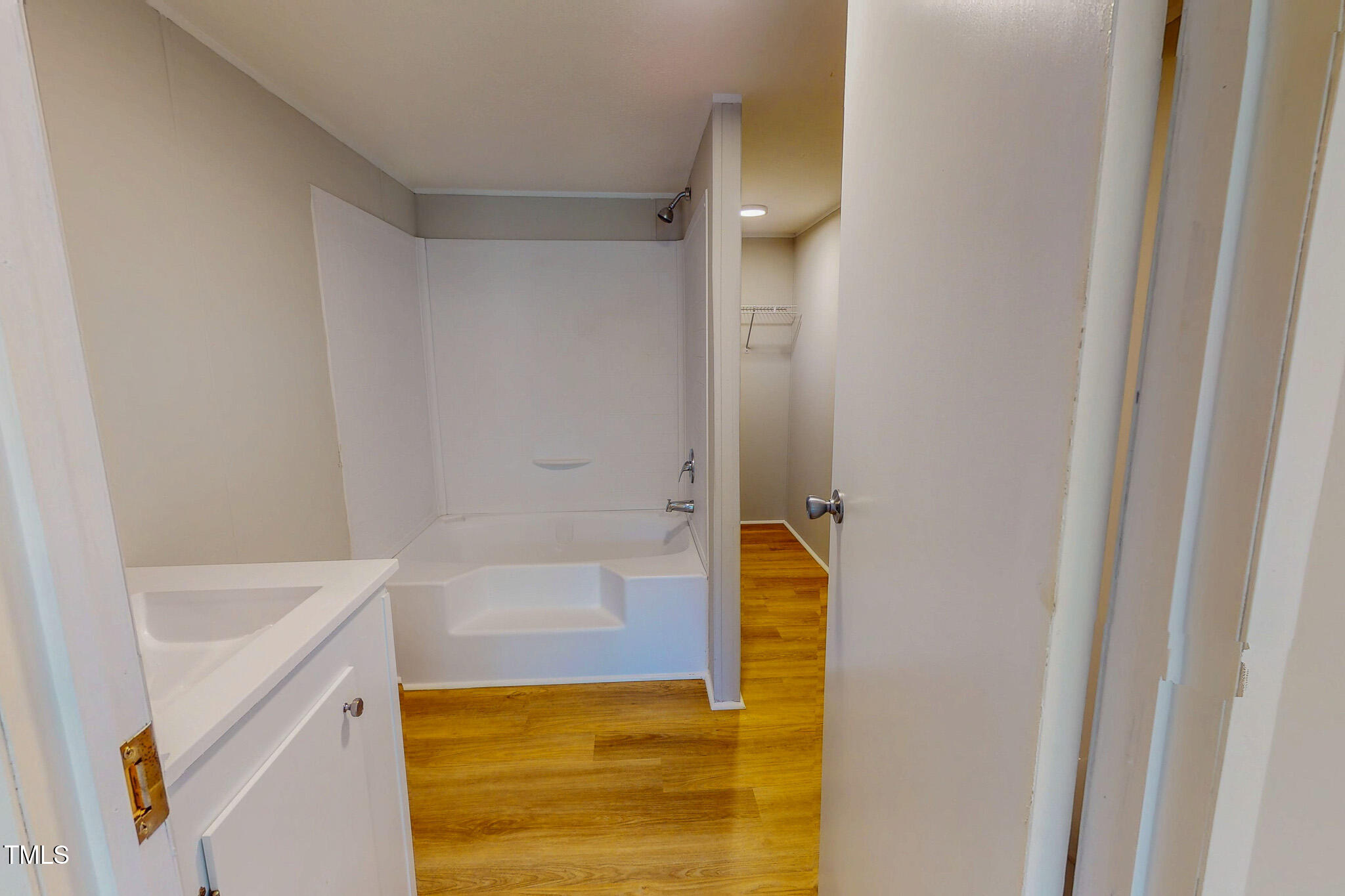 72 Red Field Lane Timberlake, NC 27583 - Photo 14 of 36 a bathroom with a tub and shower