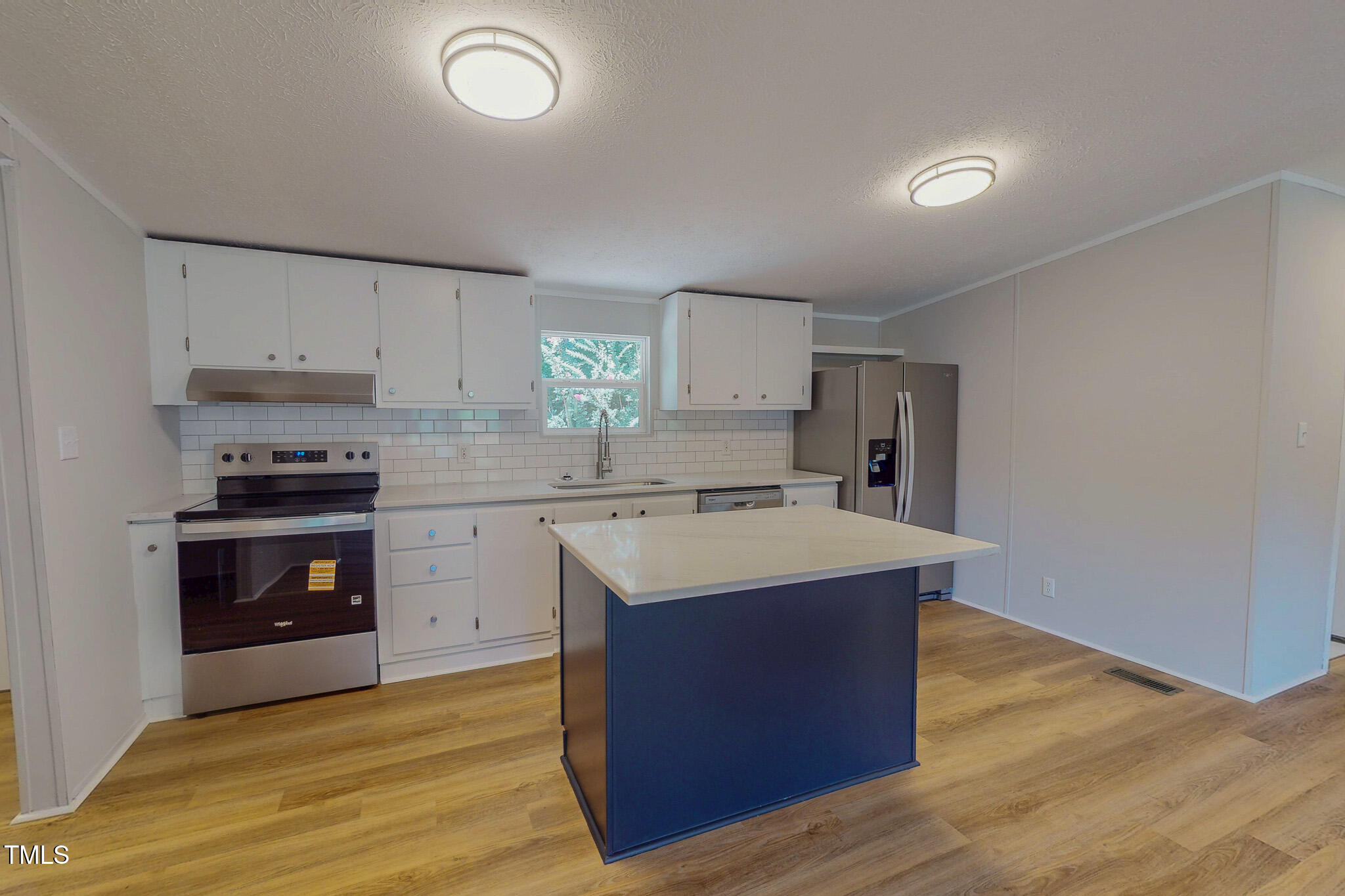 72 Red Field Lane Timberlake, NC 27583 - Photo 3 of 36 a kitchen with a sink appliances and cabinets