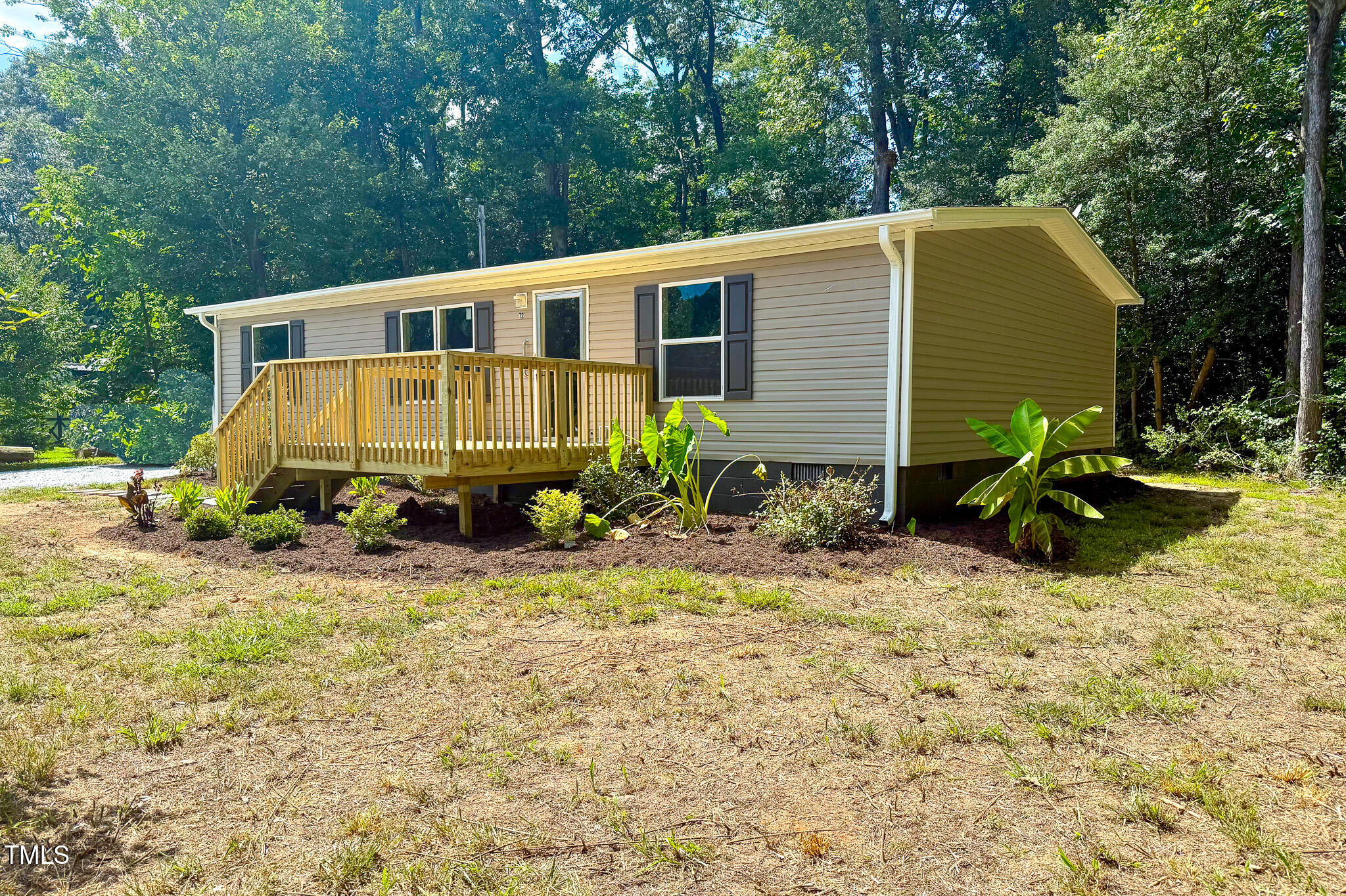 72 Red Field Lane Timberlake, NC 27583 - Photo 5 of 36 a view of a house with a yard