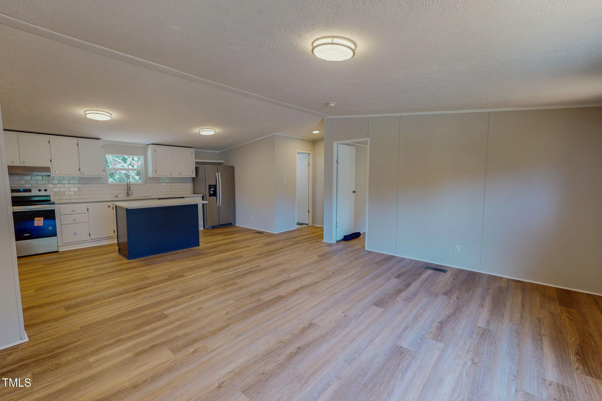72 Red Field Lane Timberlake, NC 27583 - Photo 10 of 36 a view of kitchen and kitchen with wooden floor