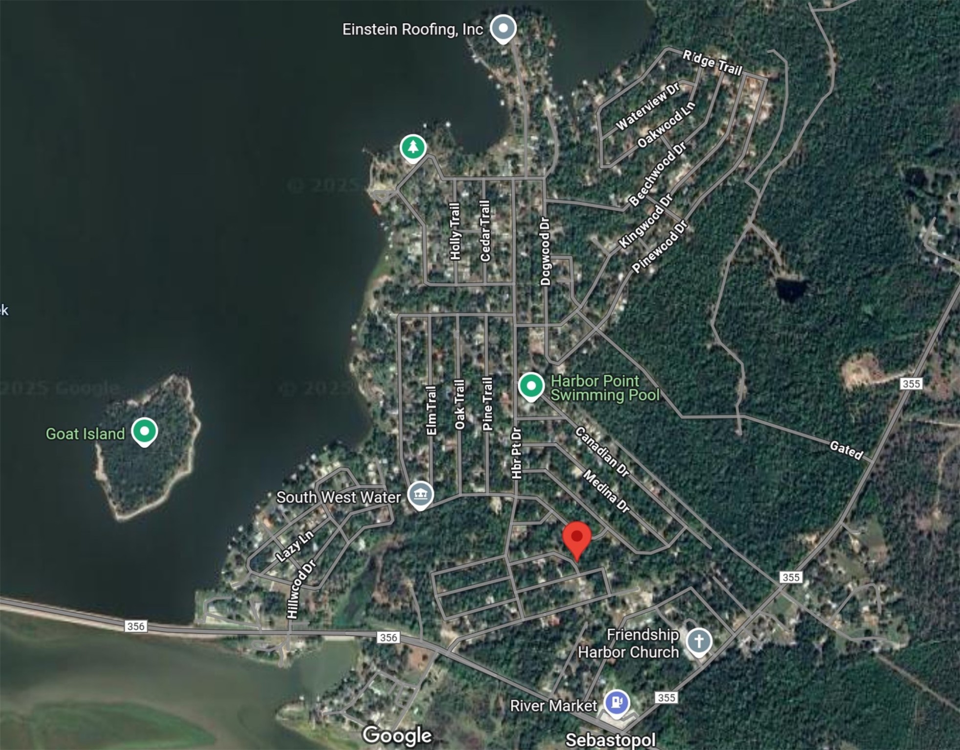 Lot 51-52 Sabine Drive Trinity, TX 75862 - Photo 6 of 6 a picture of tree next to a yard