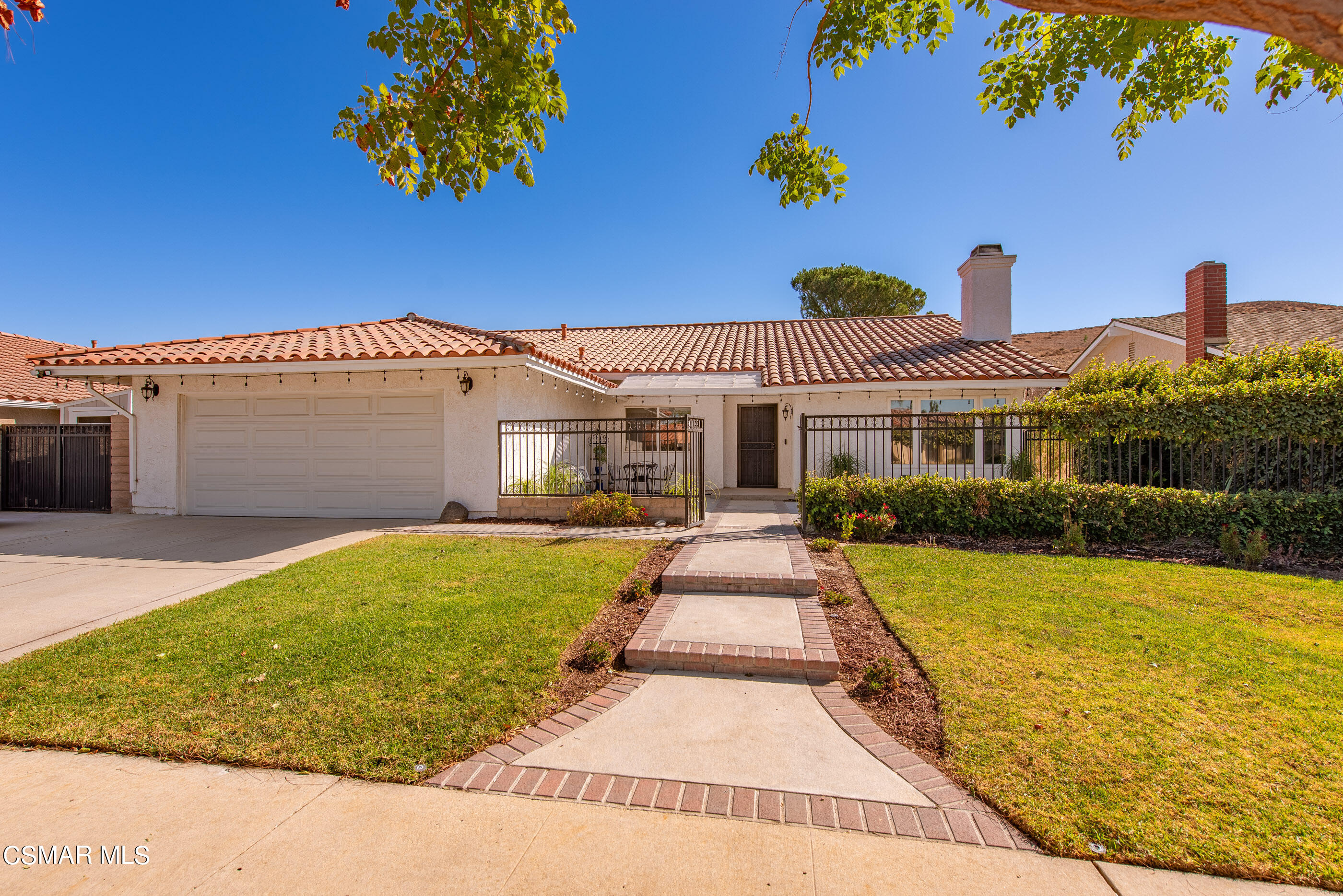 3386 Texas Avenue Simi Valley, CA 93063 - Photo 2 of 71 a front view of a house with a yard