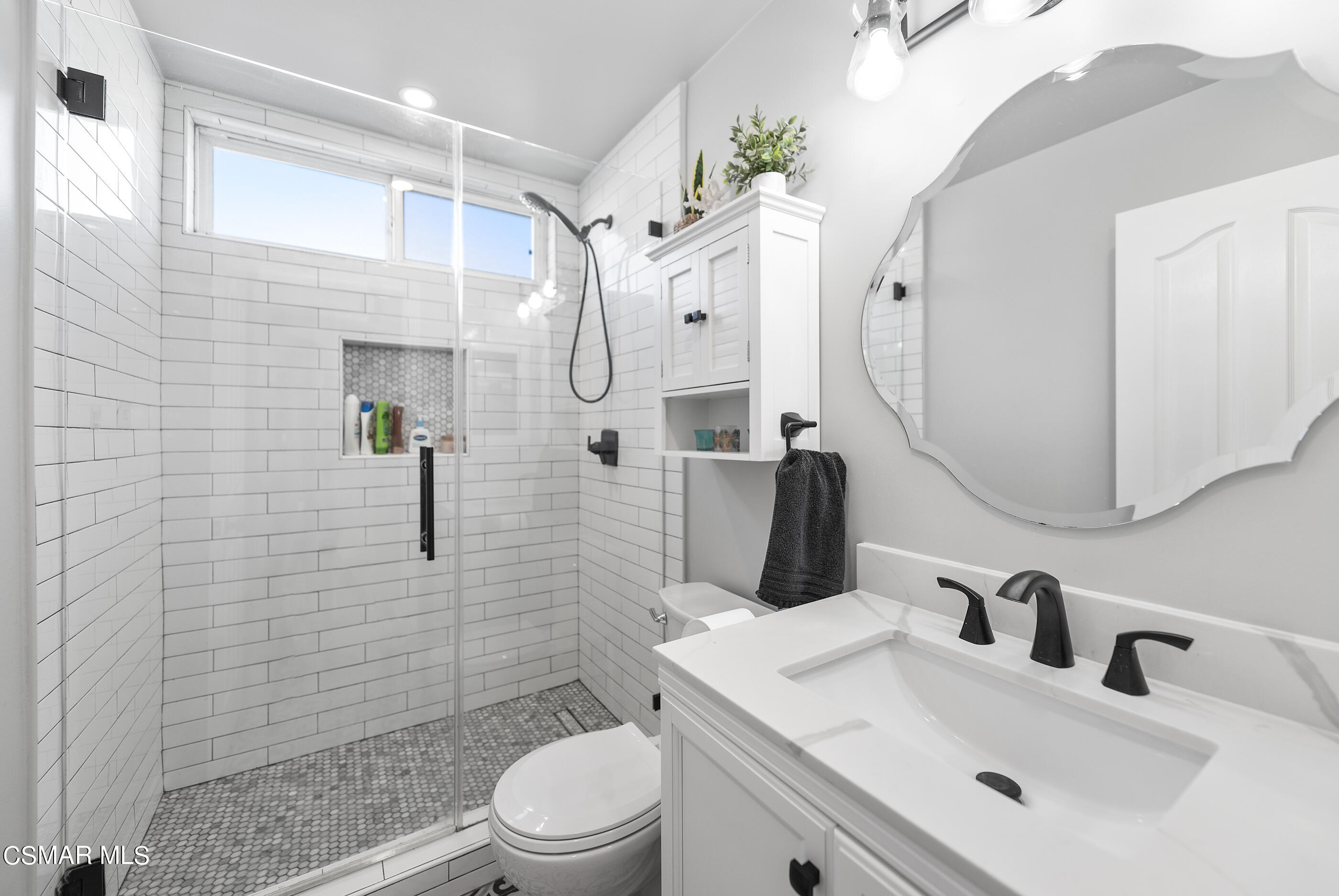 3386 Texas Avenue Simi Valley, CA 93063 - Photo 26 of 71 a bathroom with a sink toilet vanity and shower