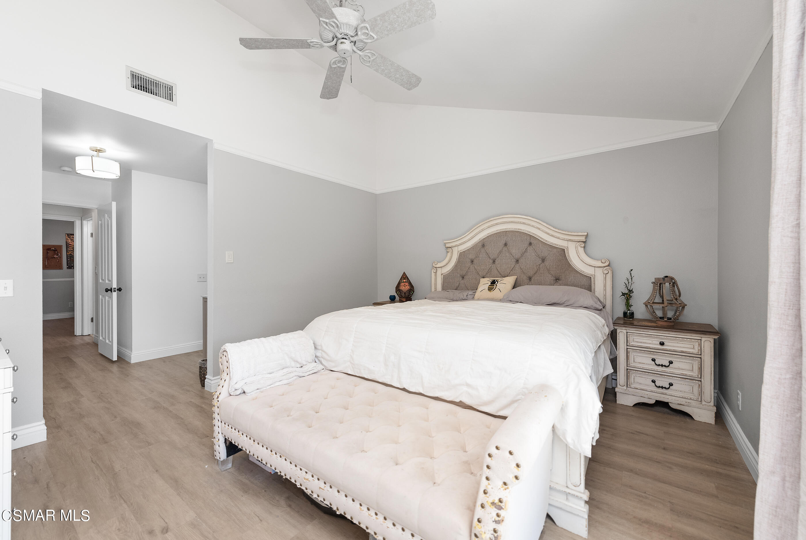 3386 Texas Avenue Simi Valley, CA 93063 - Photo 28 of 71 a bedroom with a bed and a chandelier