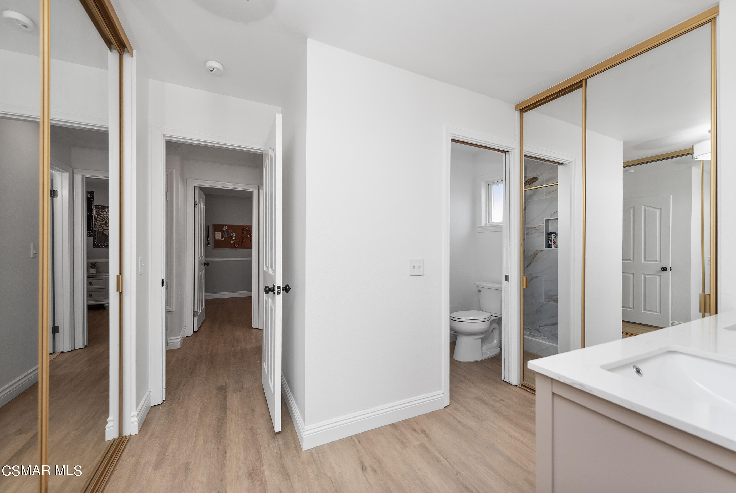 3386 Texas Avenue Simi Valley, CA 93063 - Photo 30 of 71 a view of a bathroom with a sink and a mirror