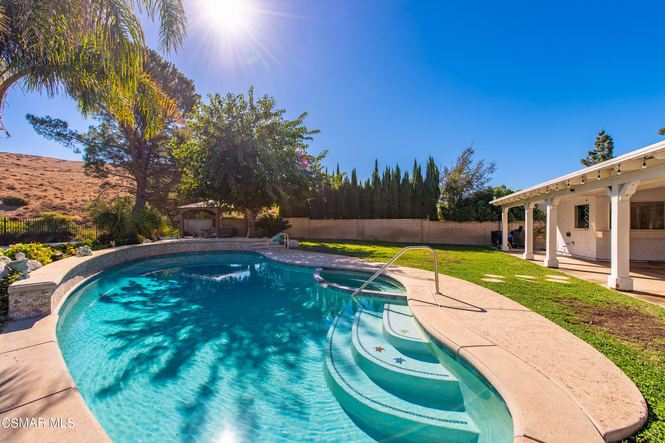 3386 Texas Avenue Simi Valley, CA 93063 - Photo 42 of 71 a view of a swimming pool with a yard and plants