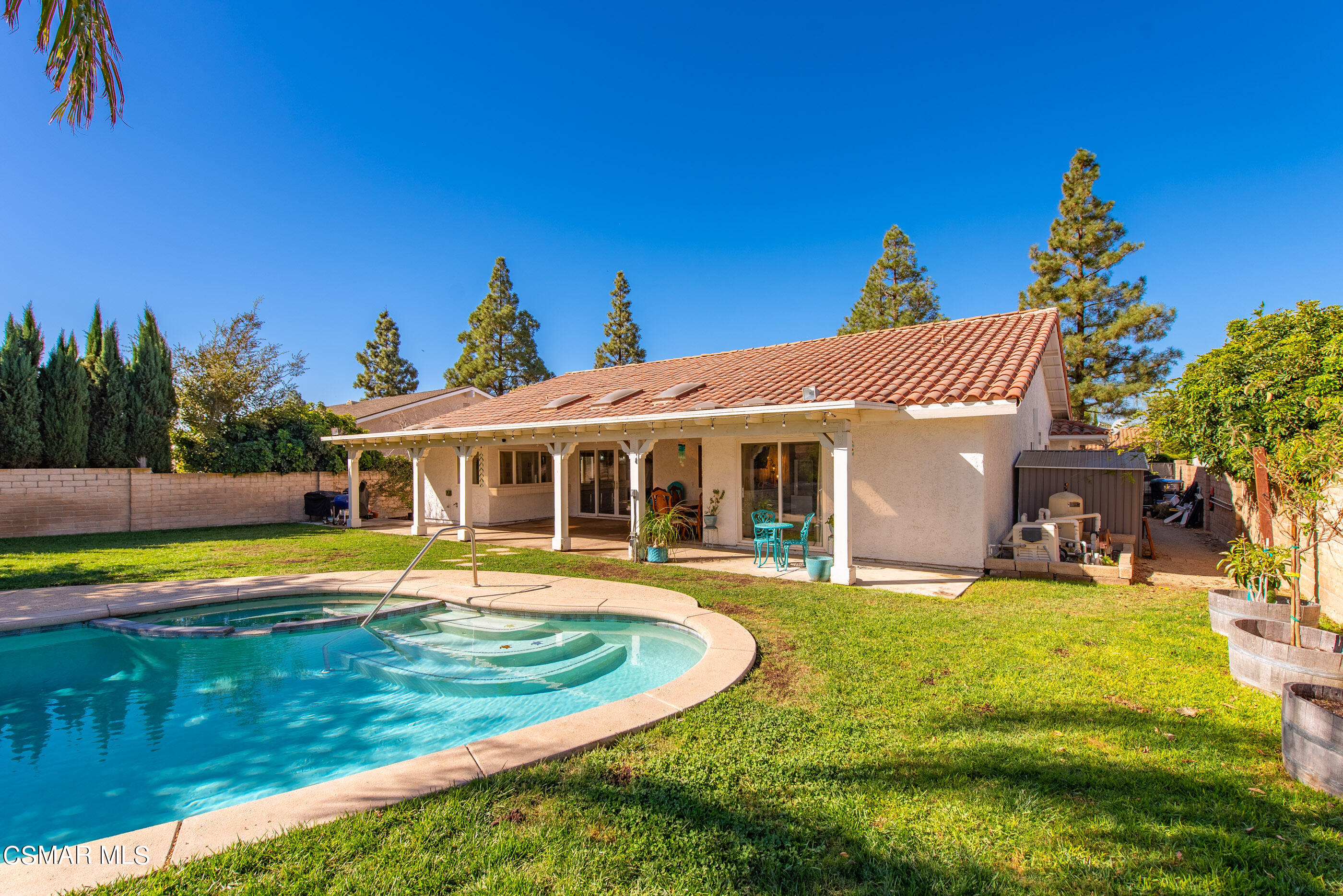 3386 Texas Avenue Simi Valley, CA 93063 - Photo 43 of 71 a view of a house with swimming pool and a yard