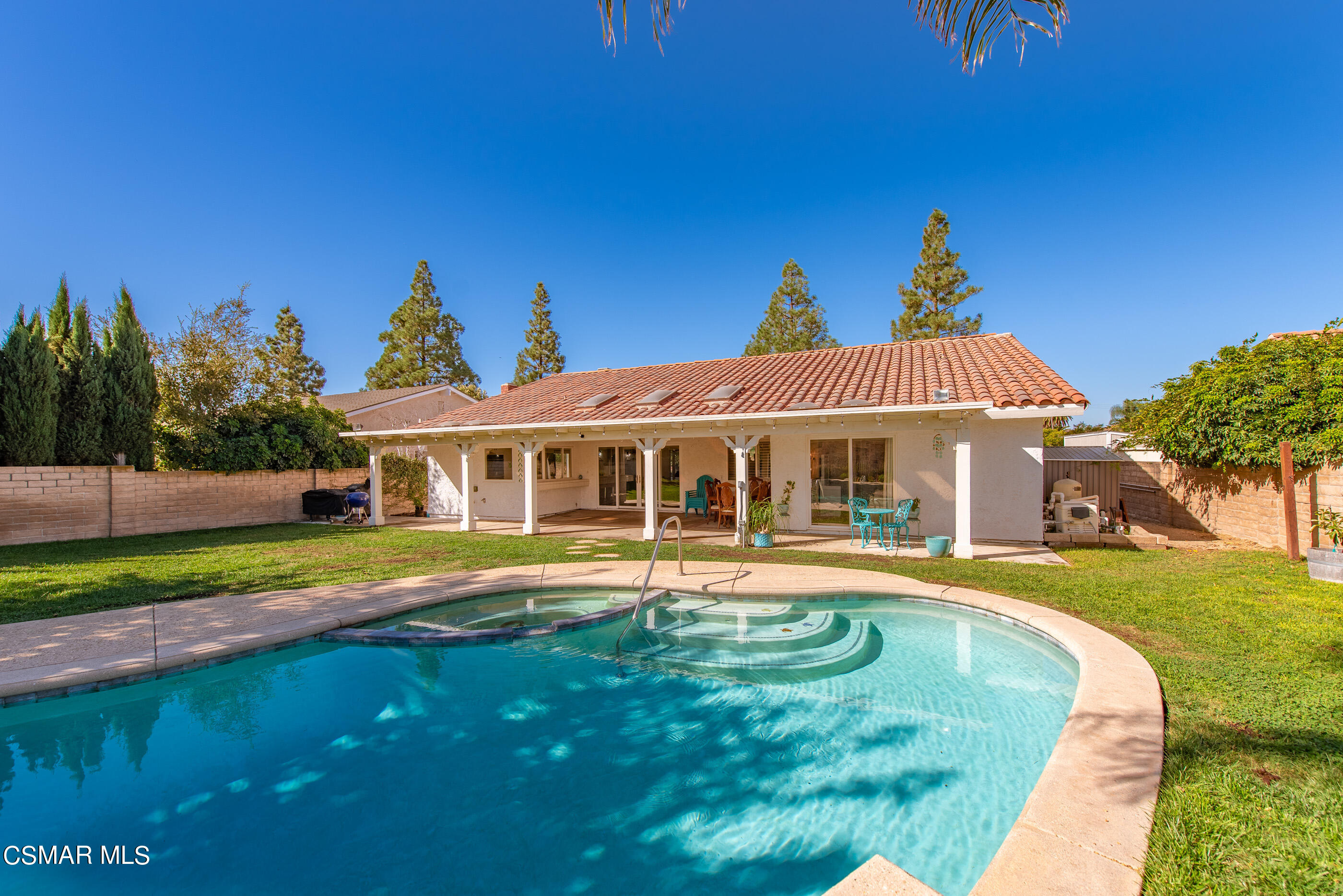 3386 Texas Avenue Simi Valley, CA 93063 - Photo 44 of 71 a front view of a house with a yard table and chairs