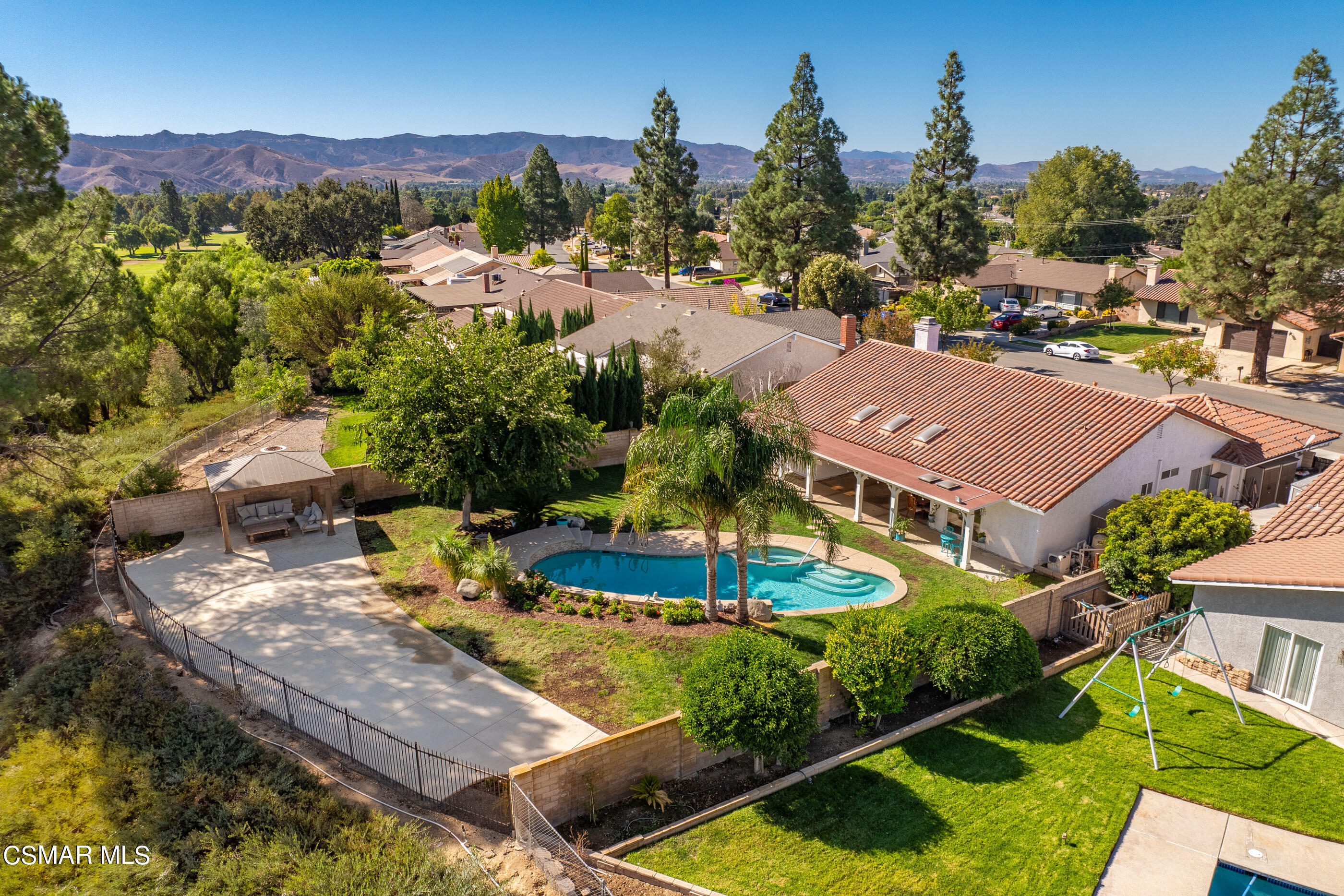 3386 Texas Avenue Simi Valley, CA 93063 - Photo 68 of 71 an aerial view of a house with a garden and lake view