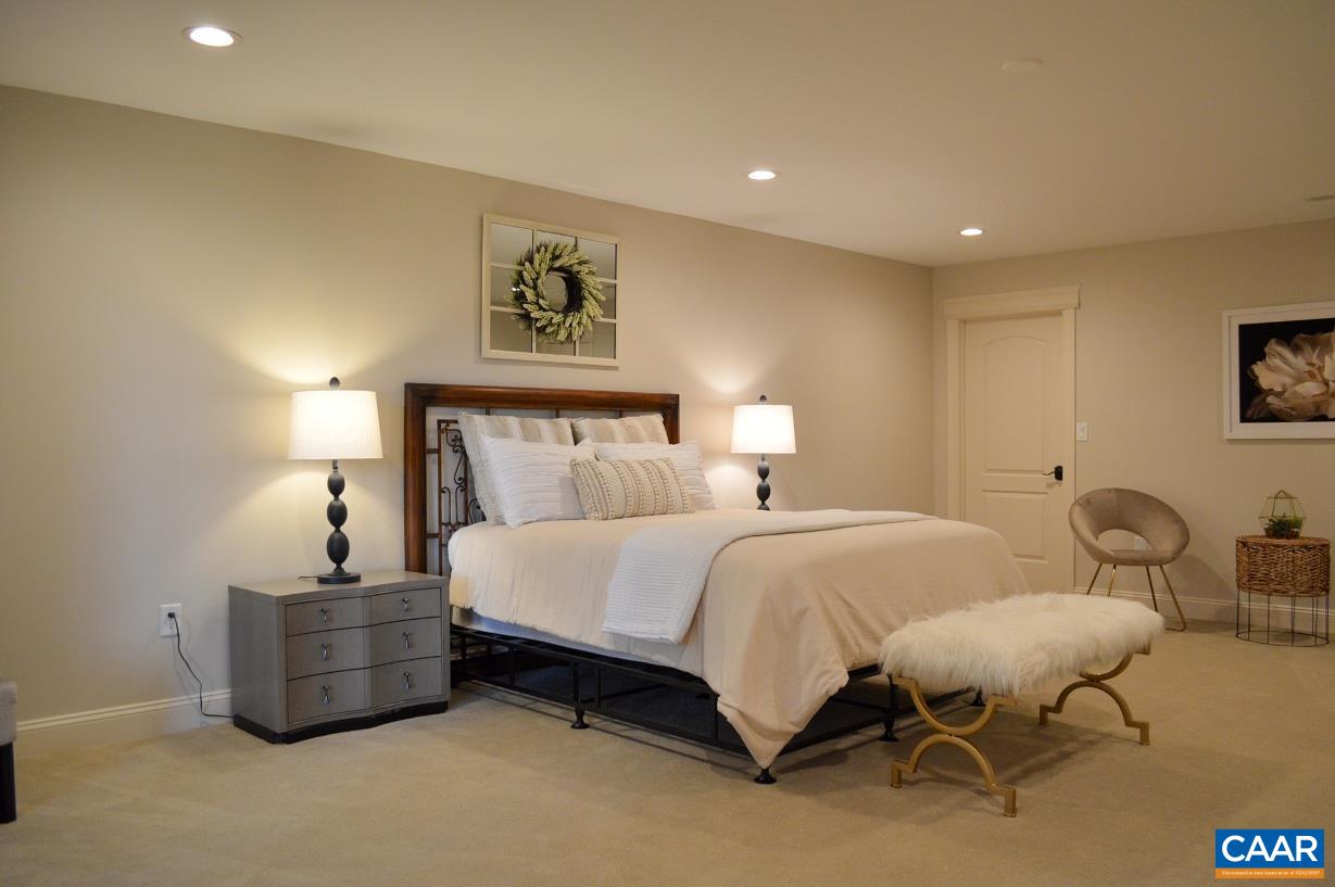 275 Blue Ridge Road Ruckersville, VA 22968 - Photo 36 of 59 a bedroom with bed and a night stand