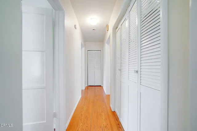 a view of a bathroom with shower and a bathtub