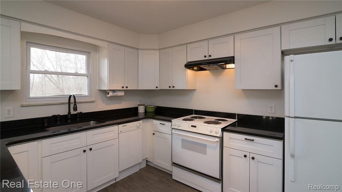 2655 Porter Road White Lake, MI 48383 - Photo 11 of 39 Large stainless steel sink and updated faucet.