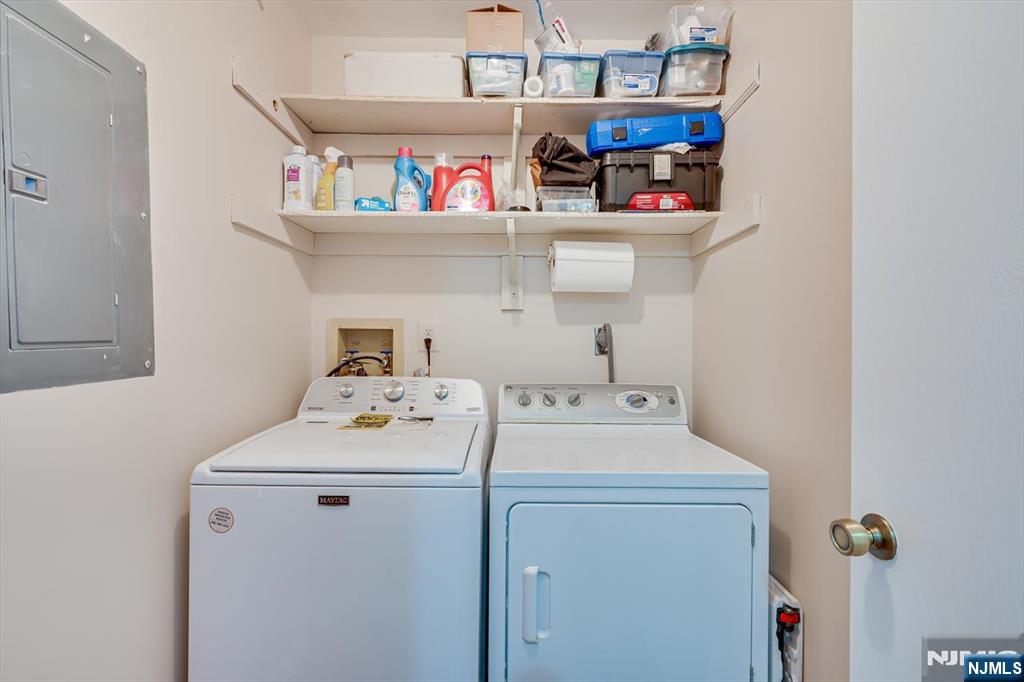 1402 Maplecrest Road, Unit 1402 Edison, NJ 08820 - Photo 32 of 37 a utility room with dryer and washer
