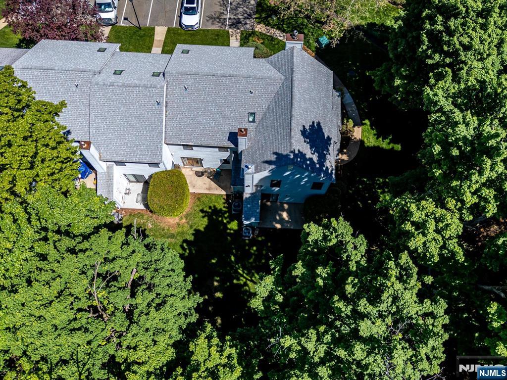 1402 Maplecrest Road, Unit 1402 Edison, NJ 08820 - Photo 34 of 37 an aerial view of a house with a yard and swimming pool