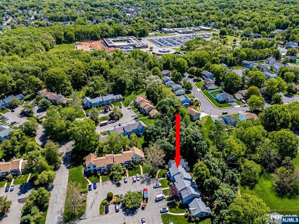 1402 Maplecrest Road, Unit 1402 Edison, NJ 08820 - Photo 35 of 37 an aerial view of residential houses with outdoor space and trees all around