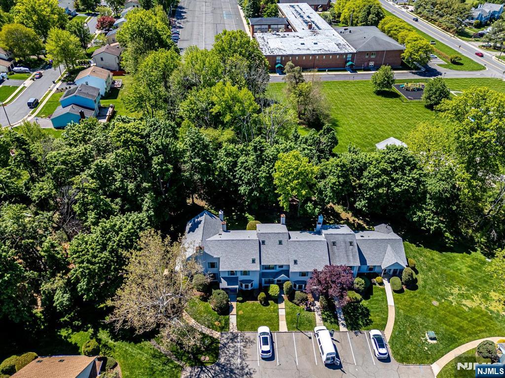 1402 Maplecrest Road, Unit 1402 Edison, NJ 08820 - Photo 7 of 37 an aerial view of a house with swimming pool a yard and outdoor seating