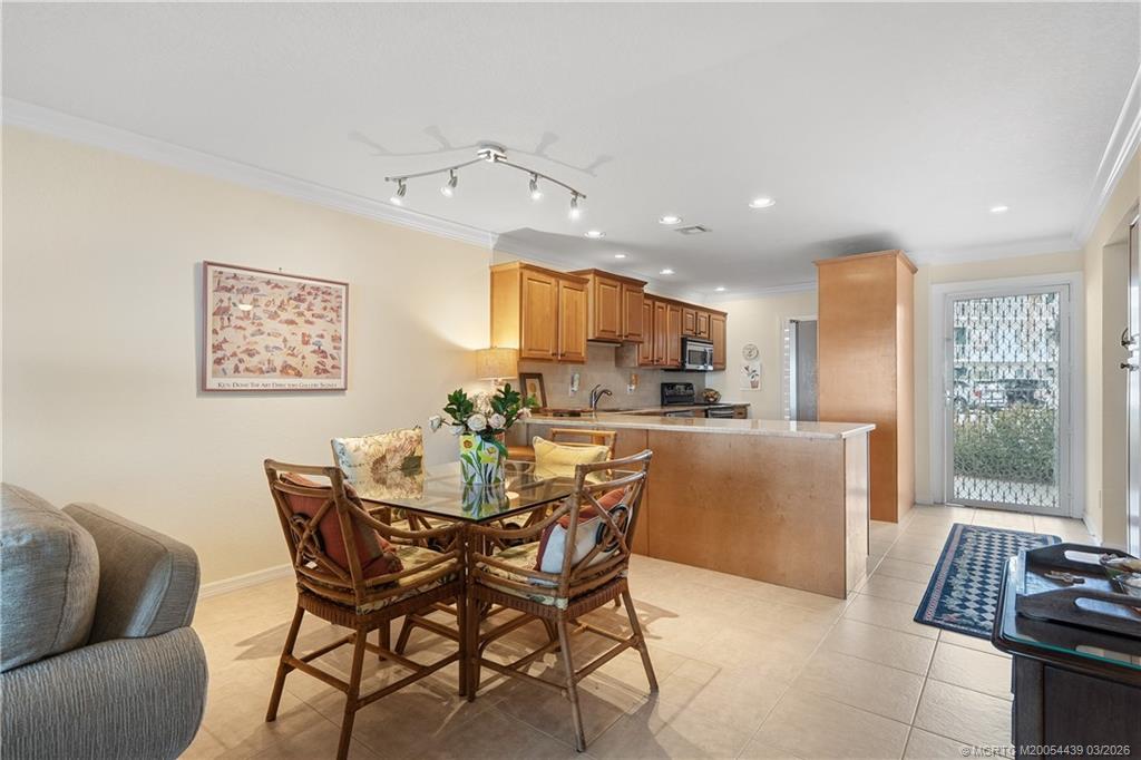 Undisclosed Address Stuart, FL 34994 - Photo 13 of 43 a view of a dining room with furniture window and outside view
